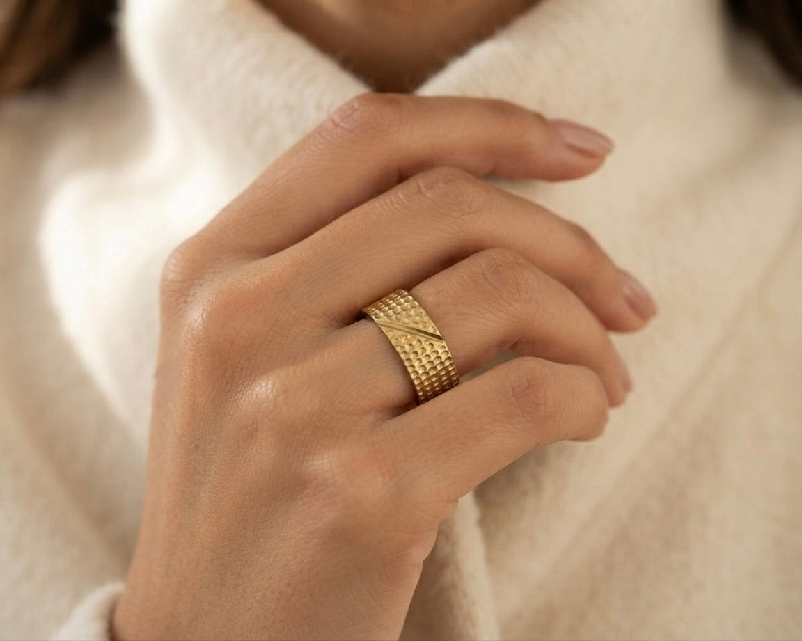Close up of brushed textured 18K Gold Virsa Ring